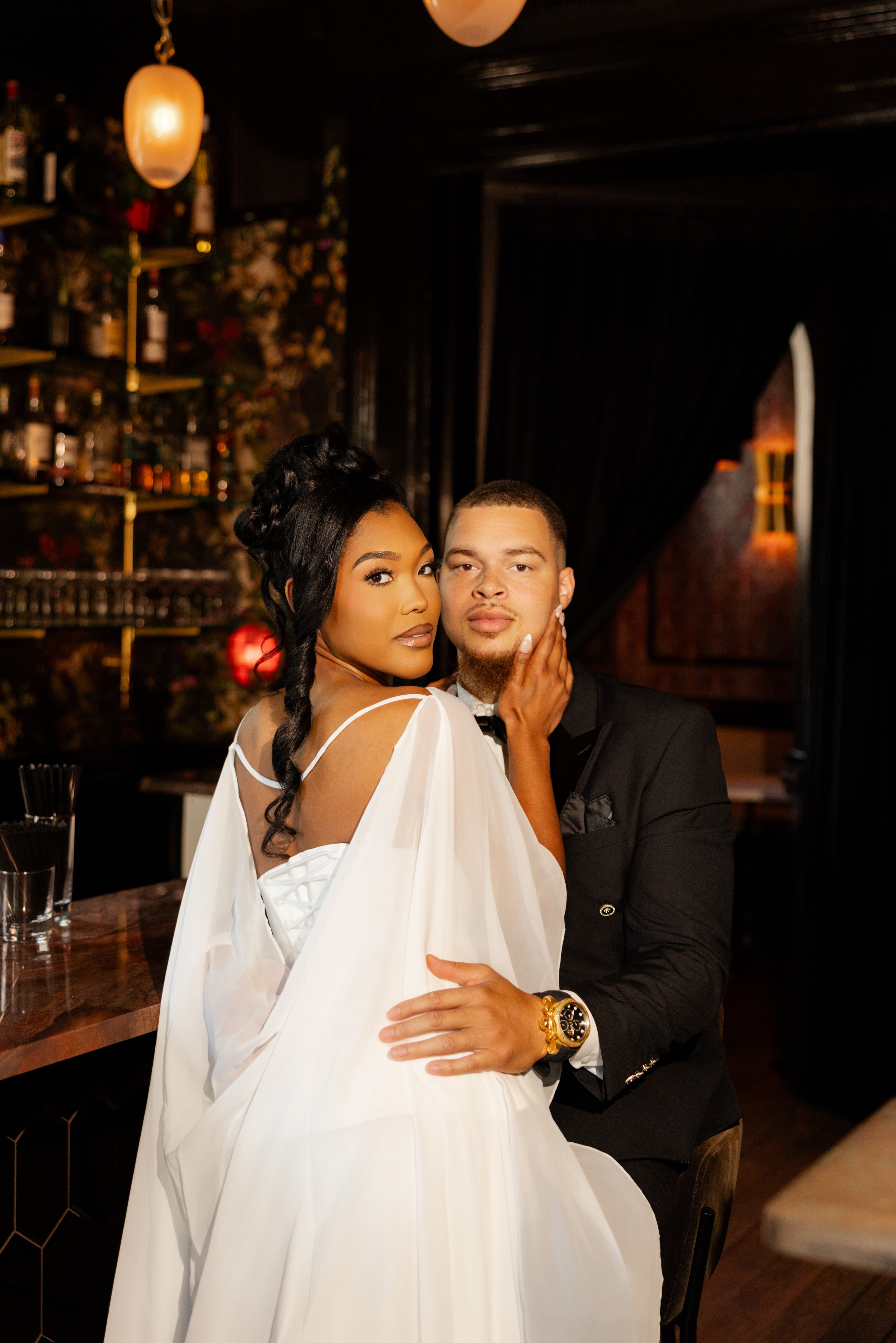 Formal seated portrait of Alexis and Nathan